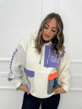 Maglione over con cappuccio e stampe colorate